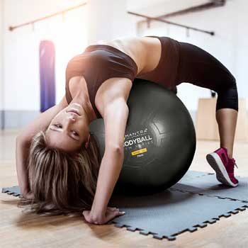 Woman Doing Backbend Stretch over Bodyball Stability Ball