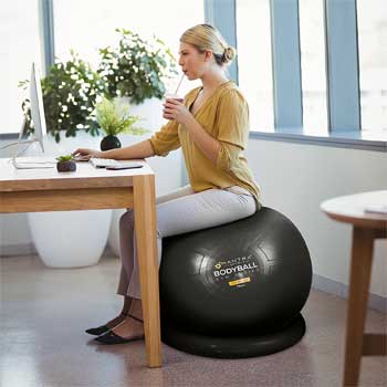 Woman Sitting on Bodyball Fitness Ball as  Office Chair