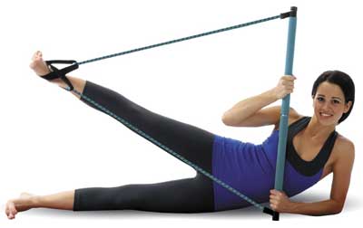 Woman Doing Pilates Workout at Home with Toning Bar